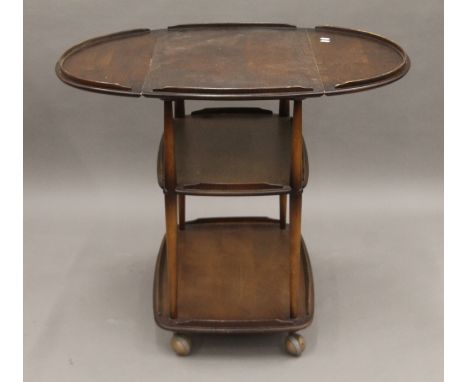 An Ercol tea trolley. 74 cm long.