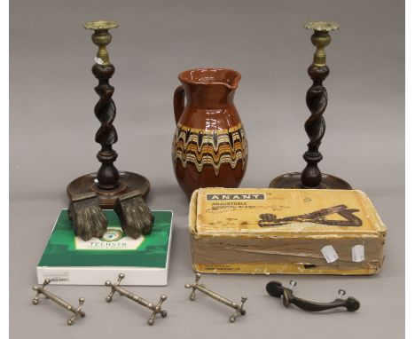 A boxed plane, candlesticks, a jug and a jade tescher. 