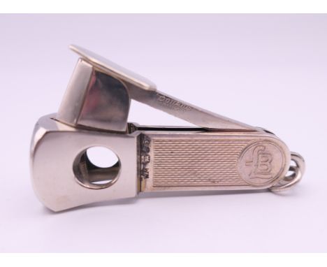 A silver cigar cutter. 6 cm long. 31.1 grammes total weight.