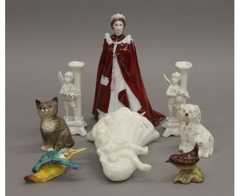 A small quantity of various porcelain, including Beswick, Royal Worcester, a model of Queen Elizabeth II (23 cm high), etc.