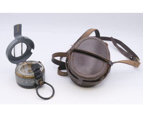 A Glauser Mk4 leather cased compass, Patent No 821719, No 1954 Made in England.