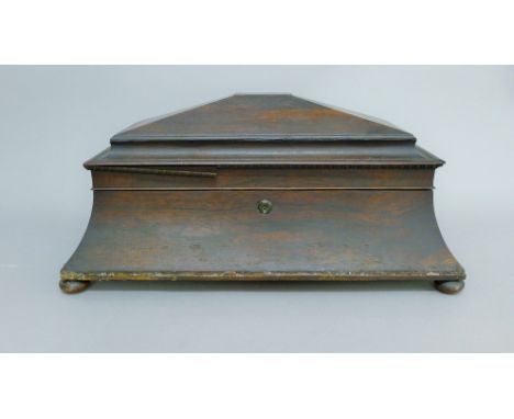 A 19th century rosewood tea caddy. 50 cm long. 
