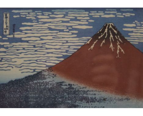 A Japanese woodcut print of Mount Fuji, framed and glazed. 17.5 x 12.5 cm.