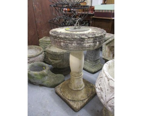 A composition stone and brass sundial on a pedestal base, 26"h 