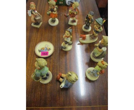 Ten Goebel figures designed by Hummel and a matching plate 