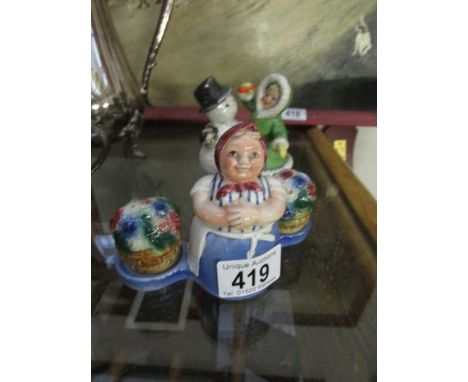A Goebel Cruet featuring woman with baskets and a Goebel with girl and carrot (a/f)