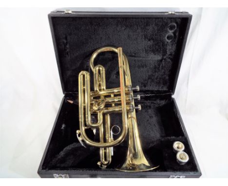  A Boose and Hawkes brass cased cornet. Estimate £20 - £40
