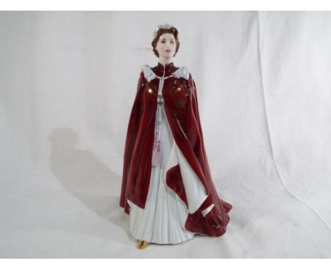 Royal Worcester - a figurine sculpted to in celebration of the 80th birthday of HM Queen Elizabeth II in the robes of The Ord