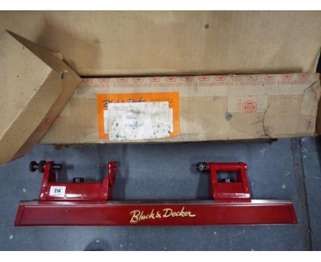 A boxed Black & Decker utility lathe designed for use with the utility quarter inch drill or sander polisher drill, boxed