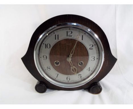 An oak cased mantel clock, Arabic numerals on a silvered chapter ring,marked Smiths ca 1930s