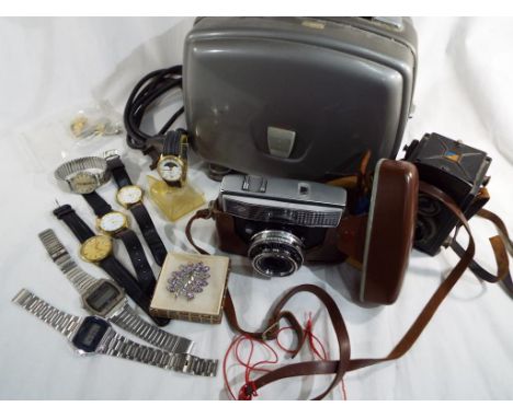 A Paillard Bolex projector, an AGFA camera, gentlemen's watches to include Tudor and other. Estimate £30 - £50