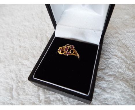 A lady's marked 14ct gold and ruby ring, approx. weight 1.9 grams, size Q, boxed - Est £60 - £90