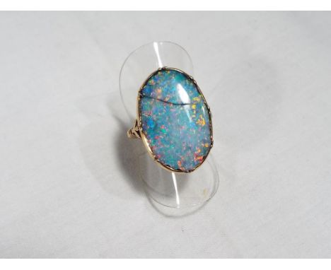 A lady's antique gold opal doublet ring, size L, approx. 5.4 gm - Est £40 - £75