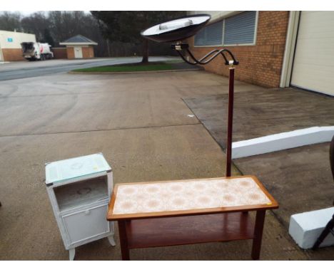 A tile topped 1970's style coffee table, a modern electric uplighter standard lamp and a white painted bedside cabinet Est £1