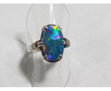 A lady's 18 carat white gold and platinum opal doublet and diamond dress ring, size N, approx. 4.5 gm - Est £100 - £140