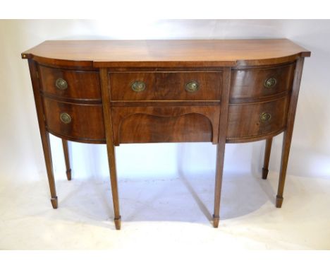 A George III Style Mahogany Semi Bow Fronted Side Board with two central drawers flanked by cupboard doors simulated as drawe