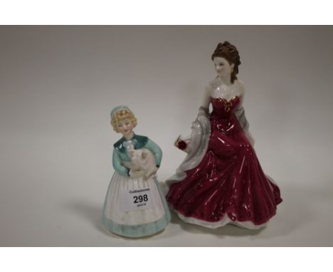 A ROYAL DOULTON 'STAYED AT HOME' FIGURE HN 2207 TOGETHER WITH A ROYAL WORCESTER 'RUBY WEDDING ANNIVERSARY' FIGURE