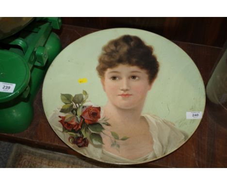 A CERAMIC CHARGER WITH HAND PAINTED PORTRAIT OF A LADY