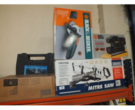 A QUANTITY OF BOXED TOOLS TO INCLUDE ANGLE GRINDER, MITRE SAW, SANDER ETC