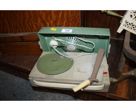 A VINTAGE STELLA MINIATURE RECORD PLAYER