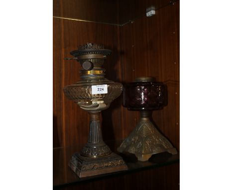 A VINTAGE OIL LAMP WITH A HINKS BENETFINK BURNER PLUS ANOTHER