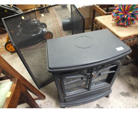 AN ELECTRIC FIREPLACE PLUS A FIREGUARD