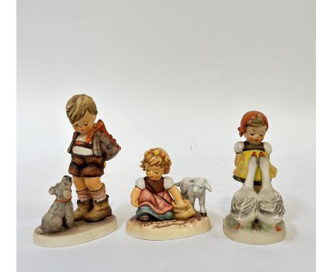 A group of three Hummel figures comprising "Goose Girl", "Not for you" (h- 14cm) and "Spring Sowing". (marked verso) (3)