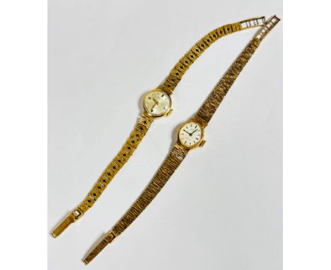 A lady's Rotary twenty one jewel, manual wind 9ct gold wristwatch with circular silvered dial, with baton markers, (d: 1.5cm)