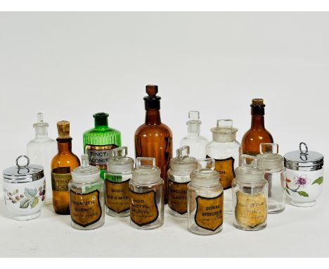 A group of fourteen various chemist tincture and powder pharmacy bottles including three brown bottles, one green bottle, sto