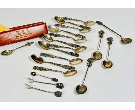 A set of eleven South American 900 standard Inca inspired handled coffee spoons, a set of three Eastern white metal floral cr