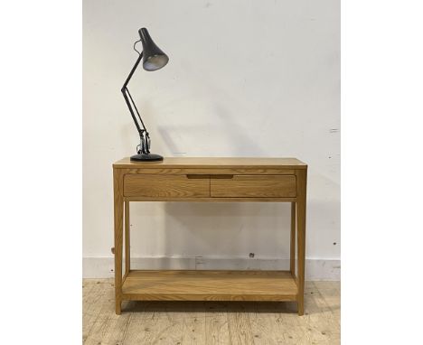 A contemporary oak console table, fitted with two frieze drawers, raised on turned supports united by an under tier, (H80cm, 