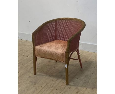 A Lloyd loom style pink and parcel gilt tub chair with upholstered seat, H68cm