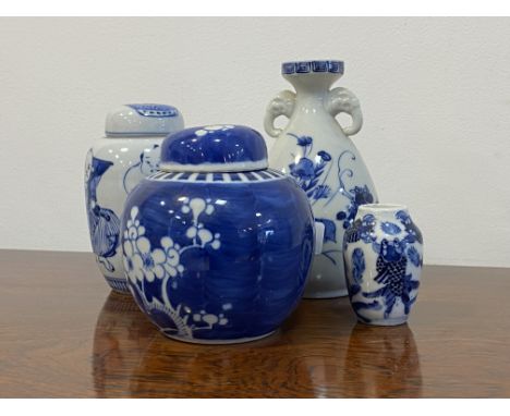 A modern Chinese porcelain blue and white ginger jar and cover with prunus decoration, (H12cm) together with a Japanese ceram