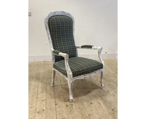 A 20th century high back open armchair, the show frame in distressed white paint enclosing tartan wool upholstered seat and b