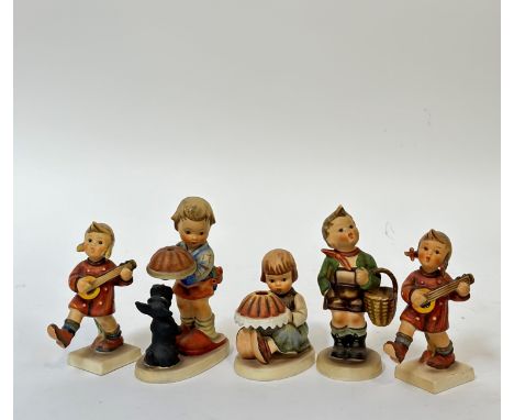 A group of five Hummel figures comprising a pair of "Happiness" figures (restoration made to both), "Begging his Share" (h- 1