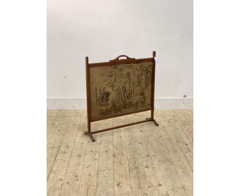 An early 20th century mahogany fire screen with embroidered tapestry panel, H74cm, W74cm