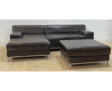 A contemporary brown leather corner sofa with footstool, raised on square section supports, H76cm, L258cm x 163cm