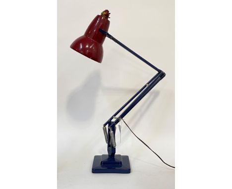 Herbert Terry, A mid century angle poise lamp, in blue and later red paint, on a stepped square base