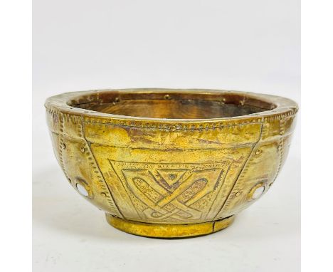 An Arts &amp; Crafts treen bowl with overlaid brass embossed panels with stylised Celtic style knots, enclosed within glass o