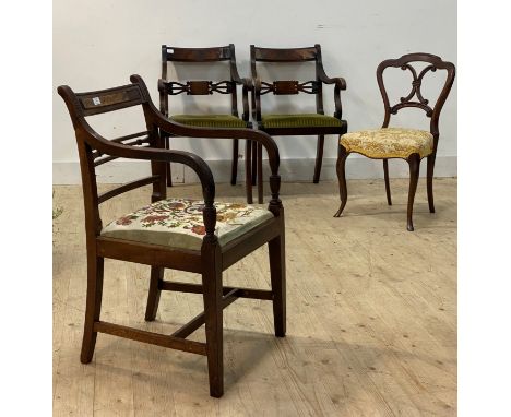 A Regency period Glasgow pattern elbow chair, the crest rail with figured inlay over reeded sweeping arms, with urn terminals