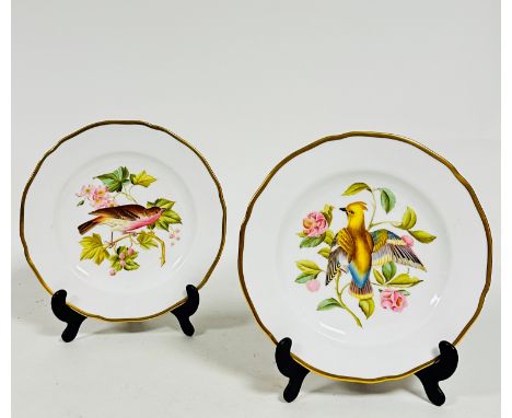 A pair of modern Spode china scalloped plates decorated with Audubon birds, including Bohemian Wax Wing, House Finch, all wit