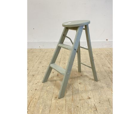 An early 20th century green painted hardwood folding stool step ladder, makers badge inscribed Ladder Atlas Stool H60cm
