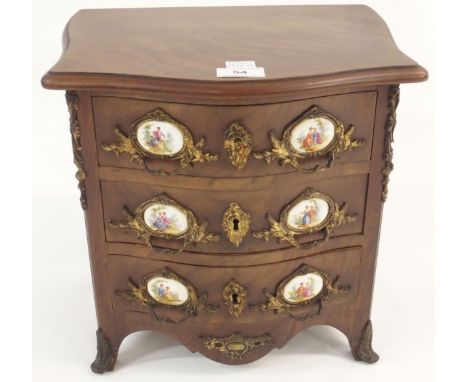 A miniature three drawer chest with ceramic plaques, 33cm high x 30cm wide x 24cm deep Condition Report: Available upon reque