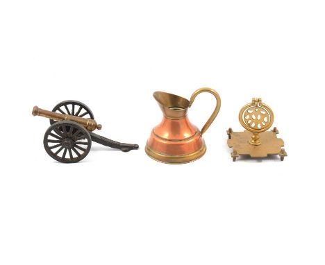 Brass candlesticks, metal model cannons, wood and brass walking stick, Schatz brass mantel clock etc.