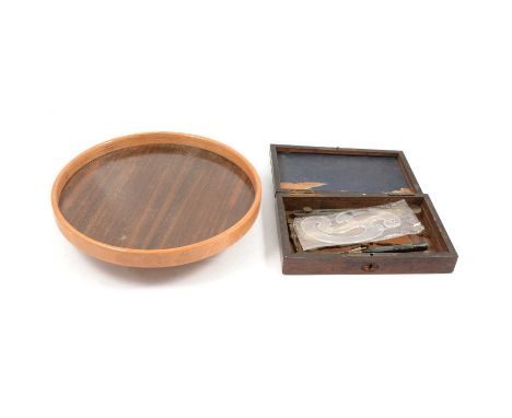 Chrome ultra lens, cased; matched set of drawing instruments; part geometry set; modern wooden lazy susan.