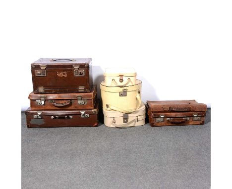 Vintage suitcases and bags; sevening including front opening leather travel case, width 40cm; another leather case; two faux 