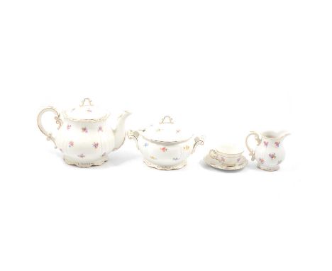 Zsolnay Pecs pottery tea and part dinner service, including coffee, tea, a soup tureen, serving bowls, platter, transferred w