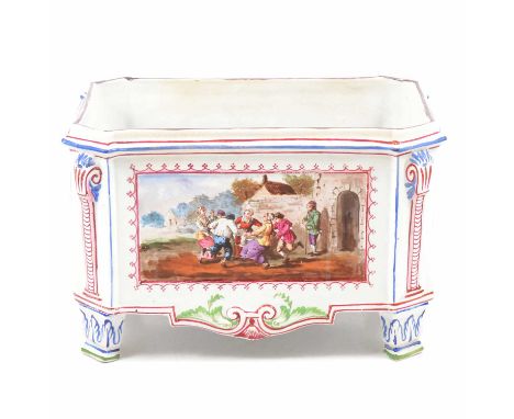 French Faience Veuve Perrin pottery jardiniere, rectangular form with canted corners, painted with figural countryside panels