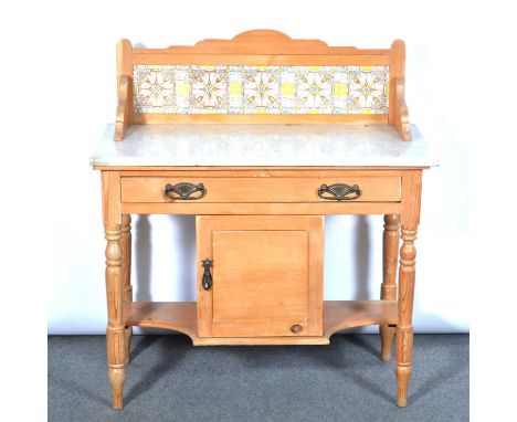 Victorian stripped walnut washstand, five-tile raised back, rectangular marble top, long drawer above a central cupboard, ope