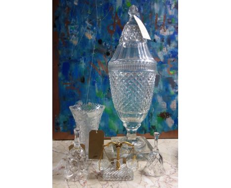 A large cut crystal vase and cover (some chips, H.69cm), a pair of cut glass salts in the form of weighing scales, 2 glass be